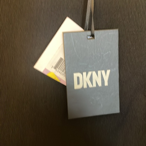 NWT- DKNY Black Chain shoulder accented
Stunning Dress - Picture 7 of 7